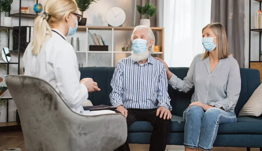 Dentist visiting patient at home